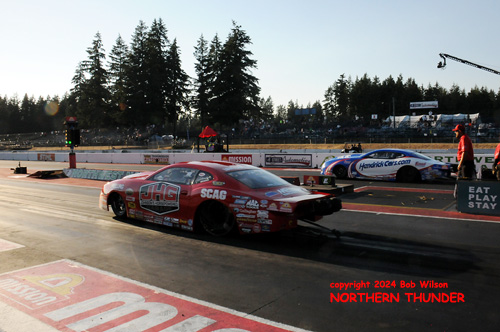 Erica Enders (near lane) vs Greg Anderson (far lane)